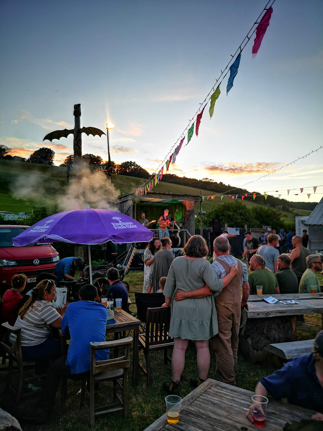 A couple enjoying the entertainment at West's Wood Fair. 